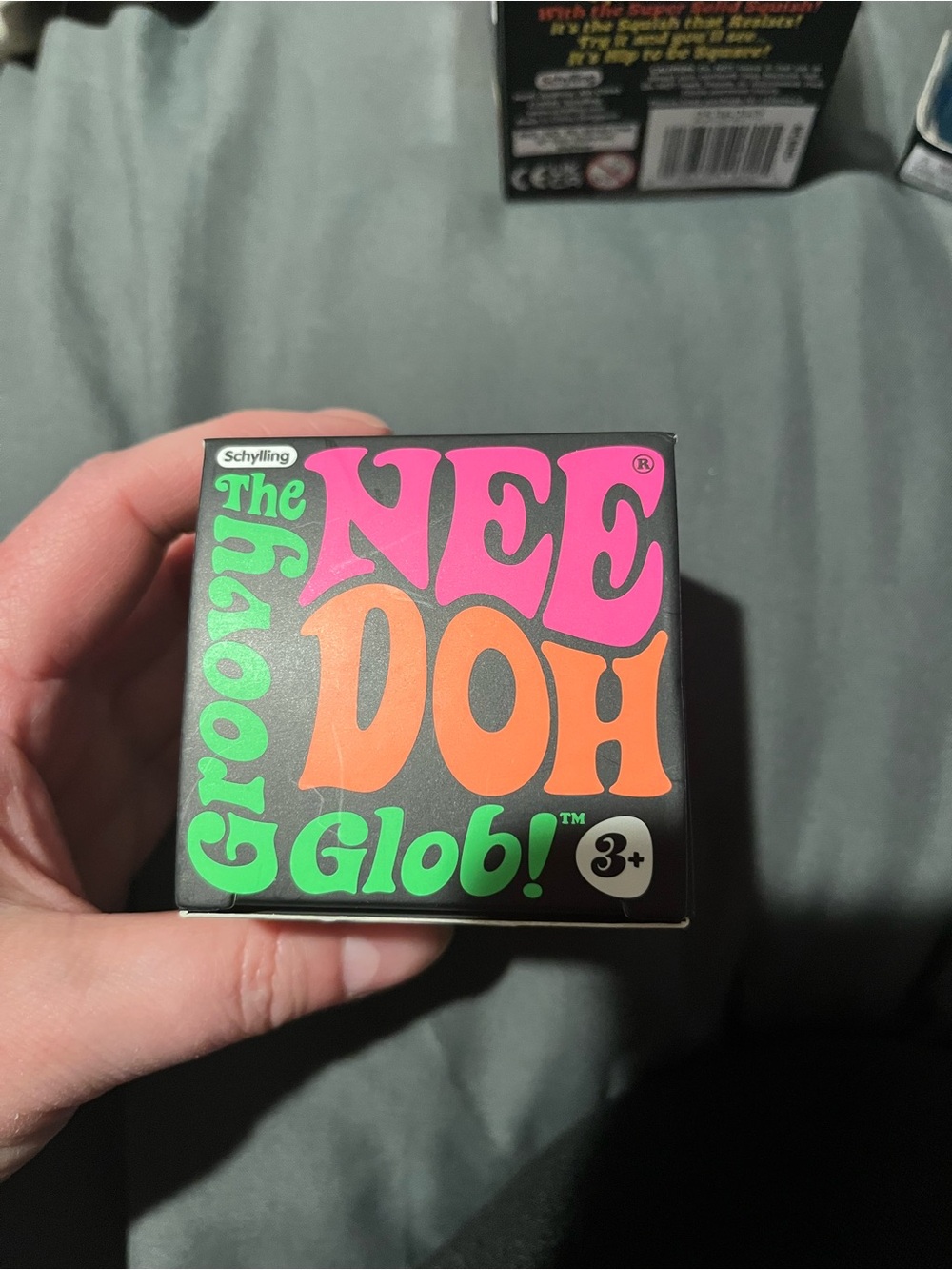 Schylling Groovy NeeDoh Glob! Kids Stress Relief Toy - Pink & Orange